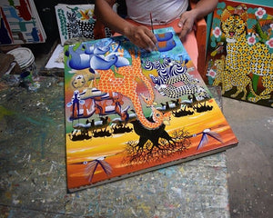 african artists making a painting