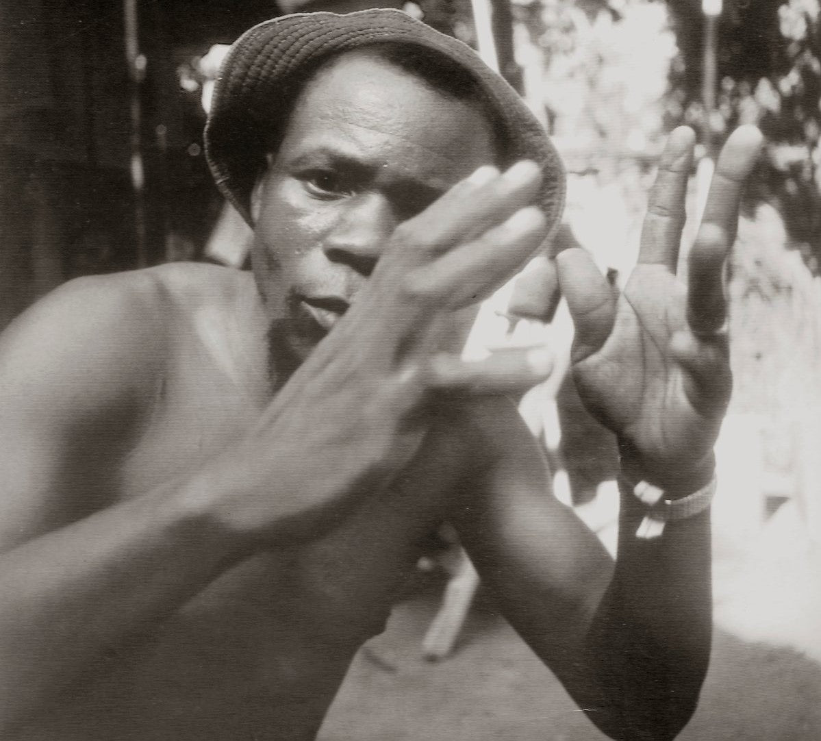 african artist painting a picture